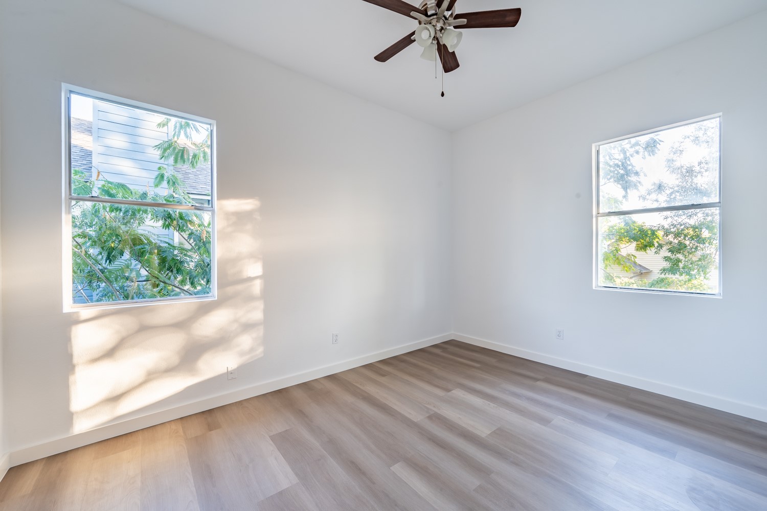 8111 Matchlock Cove Austin, TX 78729 - Photo 25 of 31 a view of a room with a window and a ceiling fan
