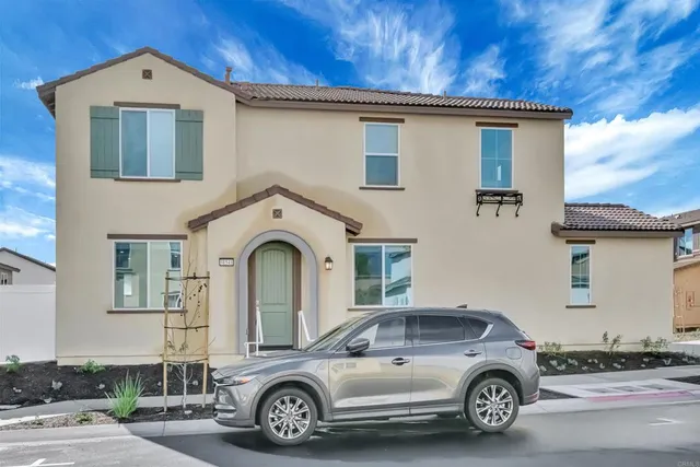 a car parked in front of a house