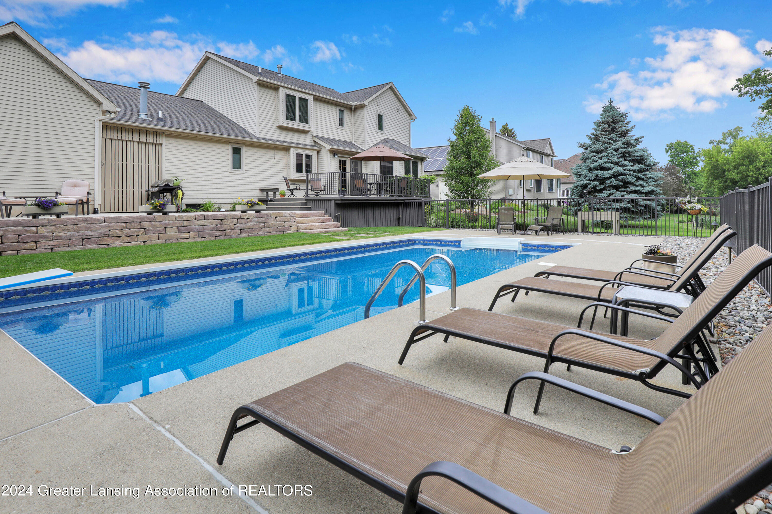 11865 Schavey Road Dewitt, MI 48820 - Photo 47 of 62 In-ground Pool