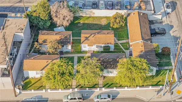 an aerial view of a house with a garden