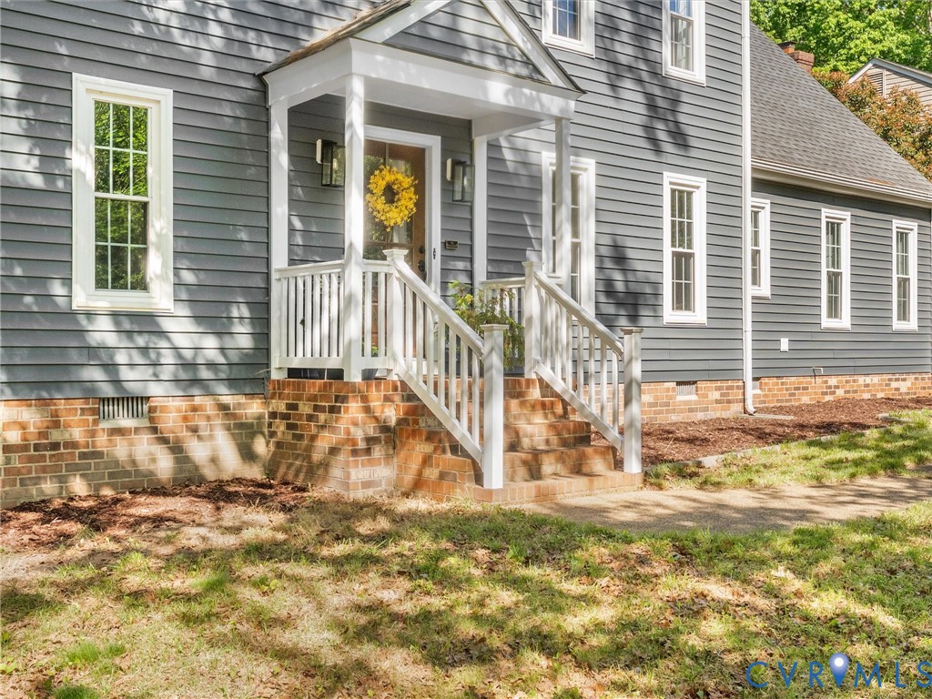 524 Glenmeadow Road Midlothian, VA 23114 - Photo 2 of 64 a view of a house with a small yard and wooden floor and fence