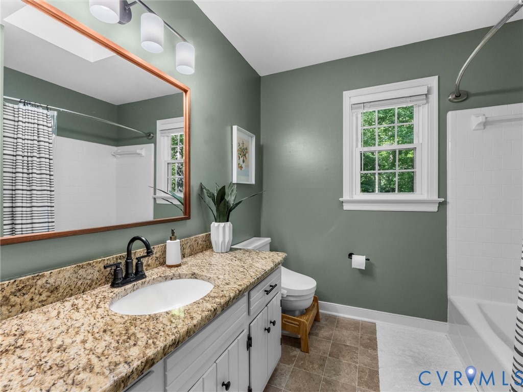 524 Glenmeadow Road Midlothian, VA 23114 - Photo 35 of 64 a bathroom with a granite countertop sink and a mirror