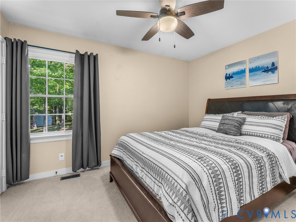 524 Glenmeadow Road Midlothian, VA 23114 - Photo 43 of 64 a bedroom with a bed and a window