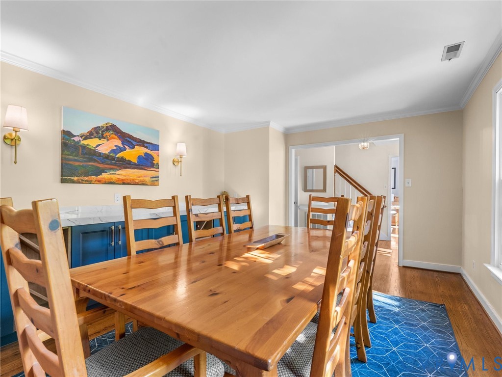 524 Glenmeadow Road Midlothian, VA 23114 - Photo 9 of 64 a dining room with furniture and wooden floor