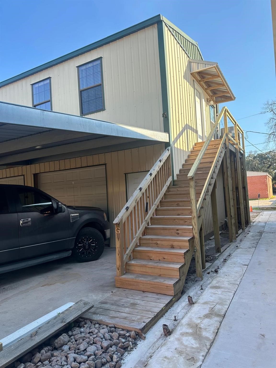 519 Spring Street, Unit G Columbus, TX 78934 - Photo 2 of 8 Experience privacy with a separate entrance to your new home, offering convenience and independence.