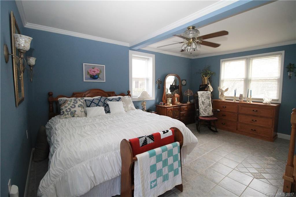 1748 Boyd Road Blackstock, SC 29014 - Photo 21 of 24 a bedroom with a bed and furniture