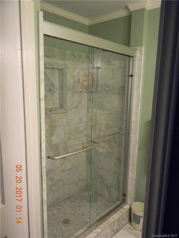 1748 Boyd Road Blackstock, SC 29014 - Photo 23 of 24 a bathroom with a glass door shower