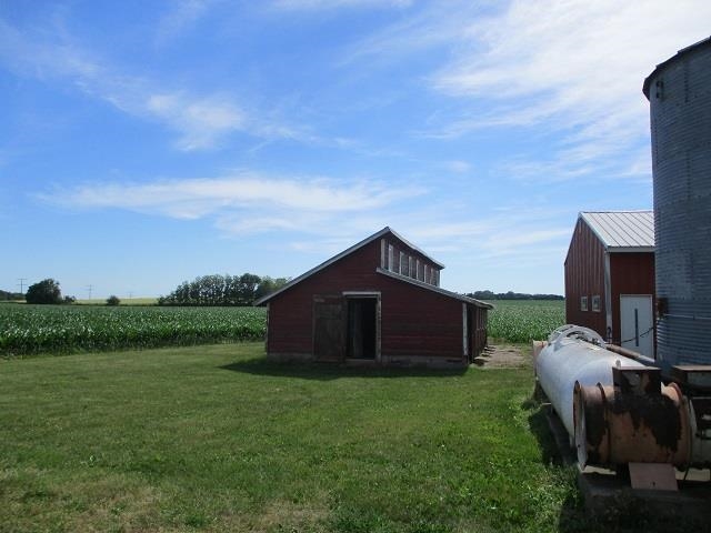 3076 Alworth Road Winnebago, IL 61088 - Photo 22 of 28 a view of a house with a backyard