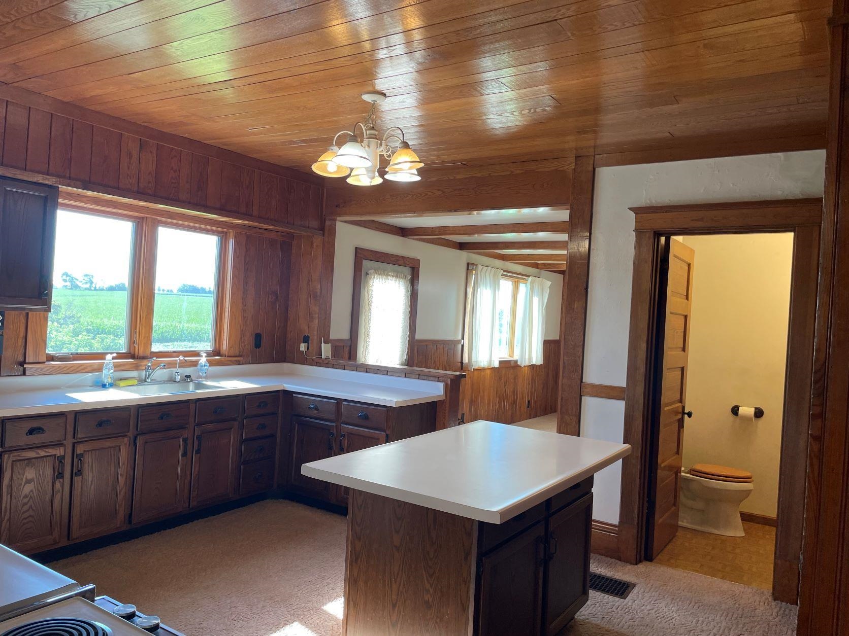 3076 Alworth Road Winnebago, IL 61088 - Photo 5 of 28 a kitchen with a sink and a large window