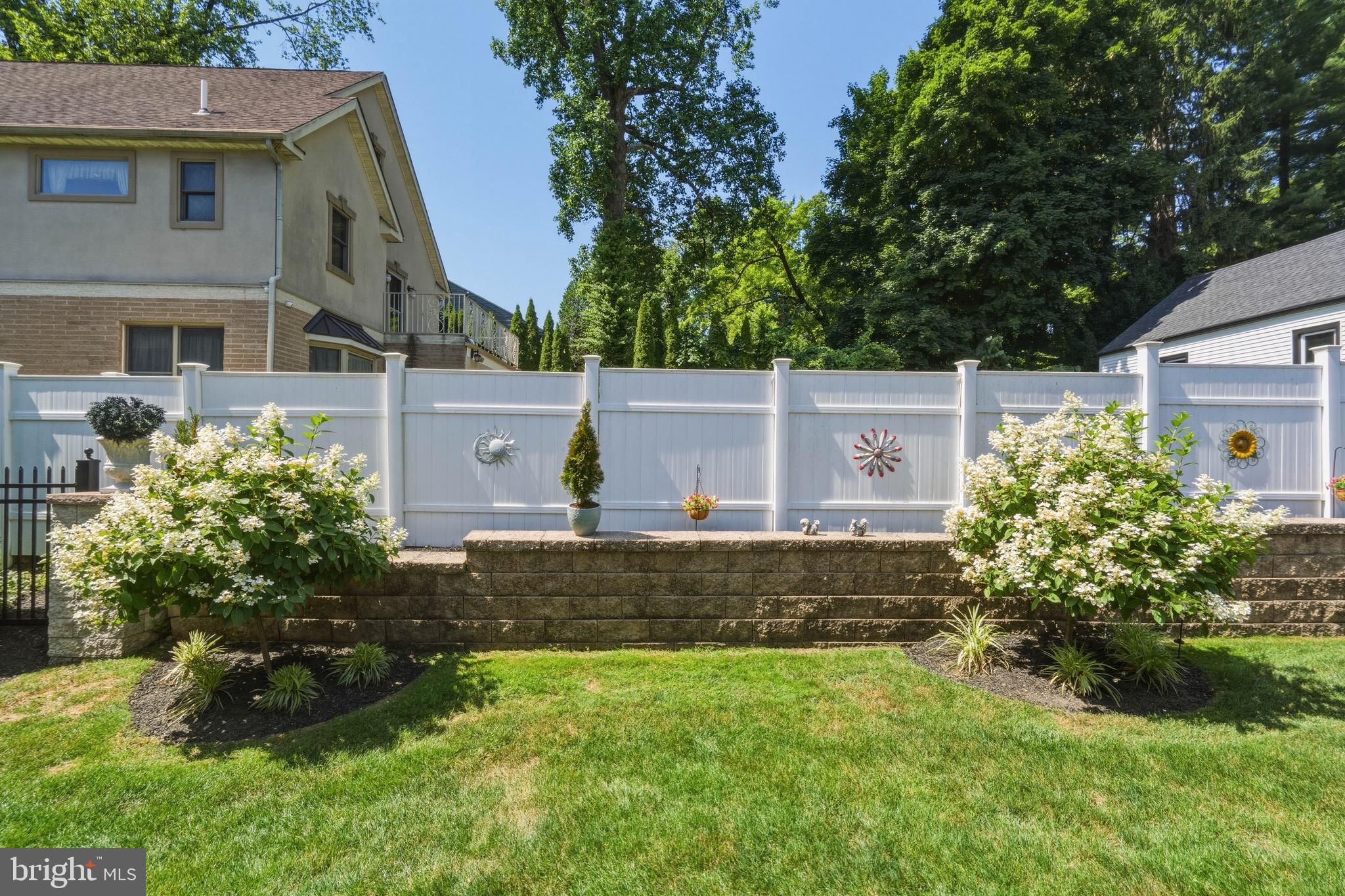13494 Proctor Road Philadelphia, PA 19116 - Photo 50 of 59 Side yard- showing retaining wall.