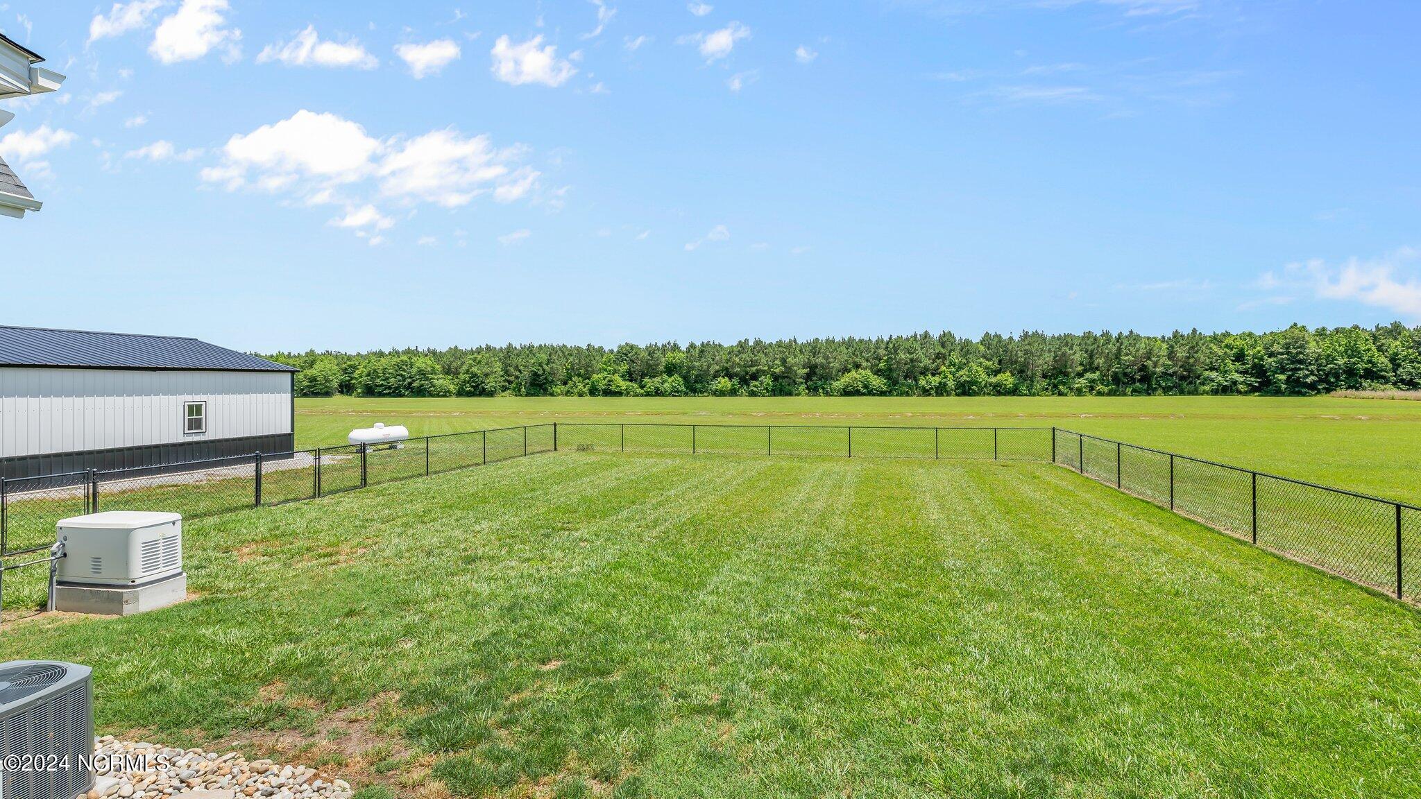 585 Northwest Backwoods Road Moyock, NC 27958 - Photo 34 of 45 54-web-or-mls-Photo May 28 2024, 12 21 4