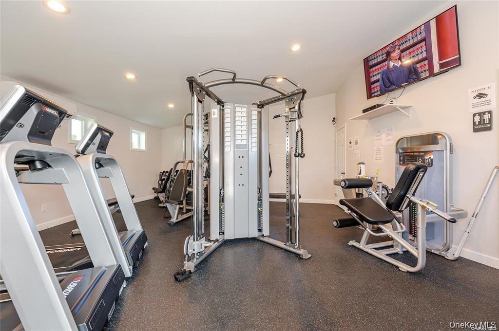 4 Rose Street, Unit 5H1 Oceanside, NY 11572 - Photo 16 of 18 a view of a room with gym equipment