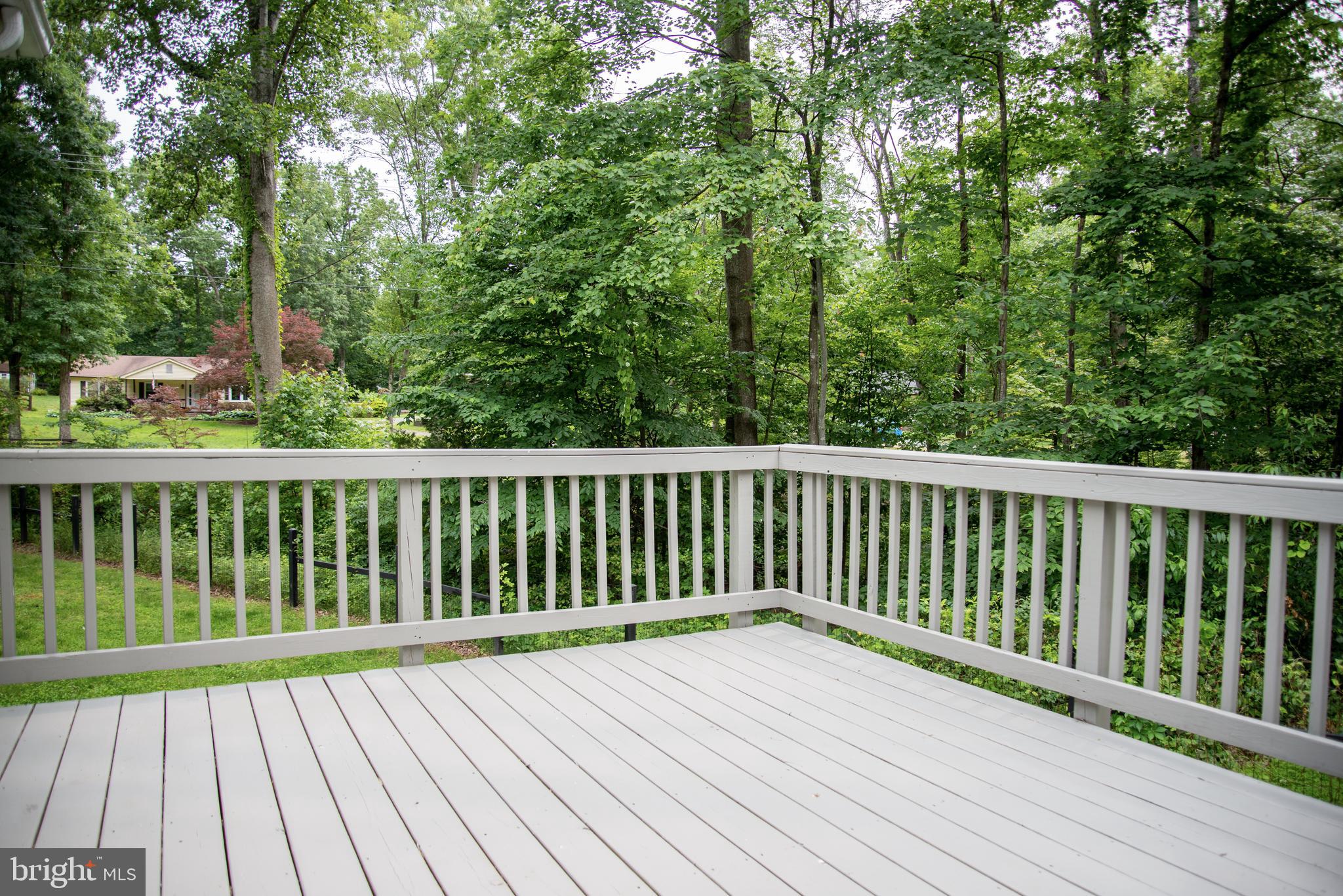 5588 Courtneys Corner Road Sumerduck, VA 22742 - Photo 18 of 22 a view of balcony with wooden floor and fence