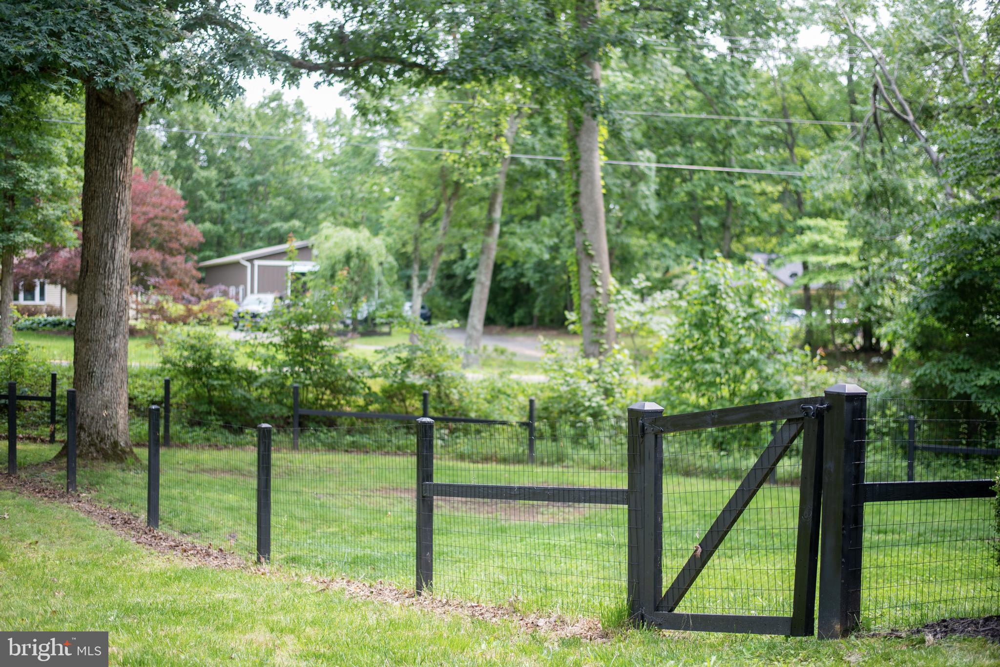5588 Courtneys Corner Road Sumerduck, VA 22742 - Photo 21 of 22 a view of a yard with a tree