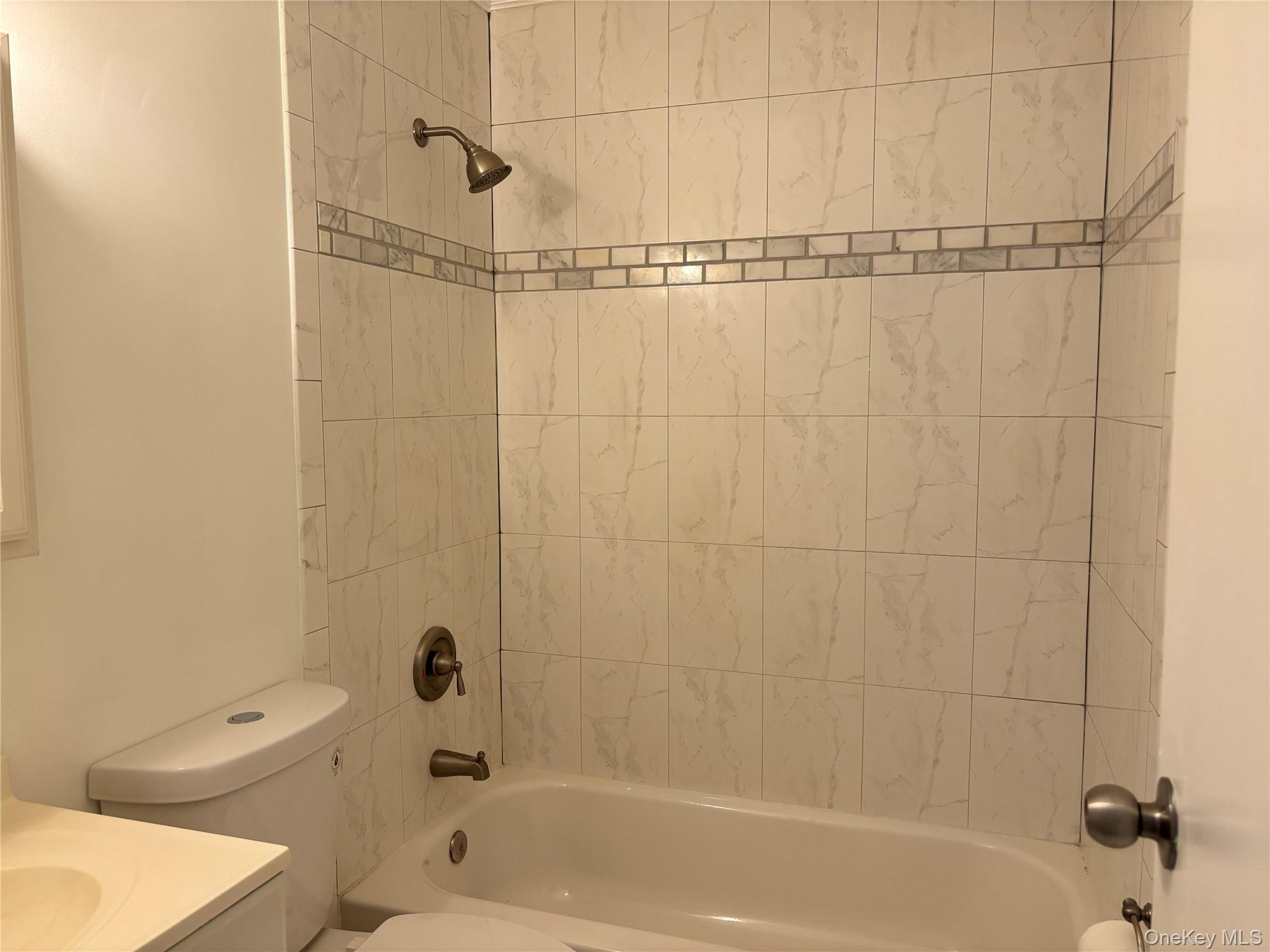 679 A Meadow Road Smithtown, NY 11787 - Photo 27 of 30 Full bathroom featuring bathtub / shower combination and vanity