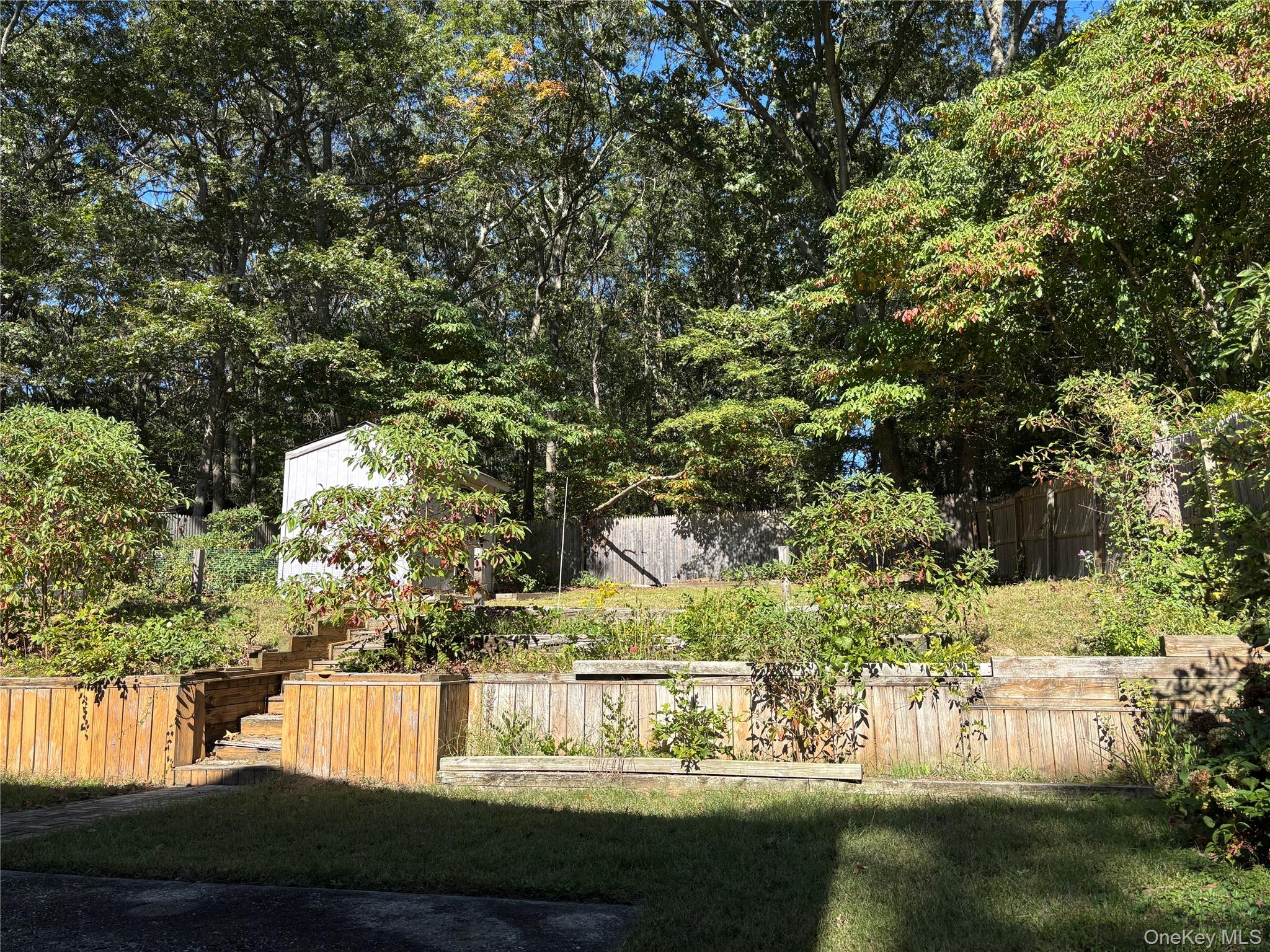 679 A Meadow Road Smithtown, NY 11787 - Photo 30 of 30 View of yard with stairs