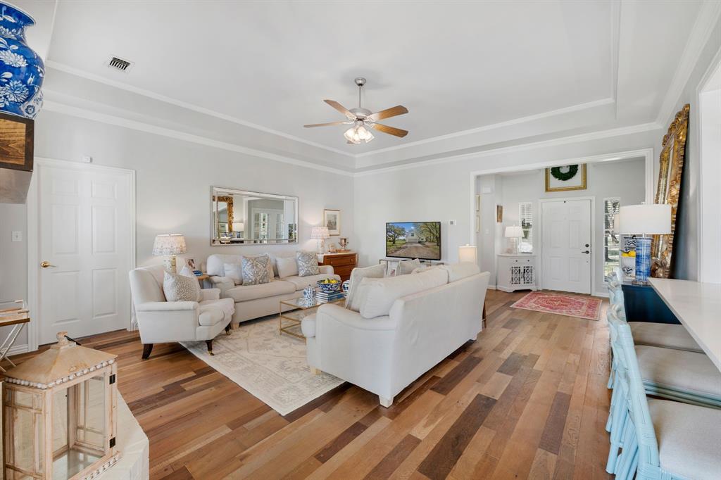 965 Stonecrest Road Argyle, TX 76226 - Photo 11 of 29 Cozy up in this gorgeous living room with tall tray ceiling and tons of natural light
