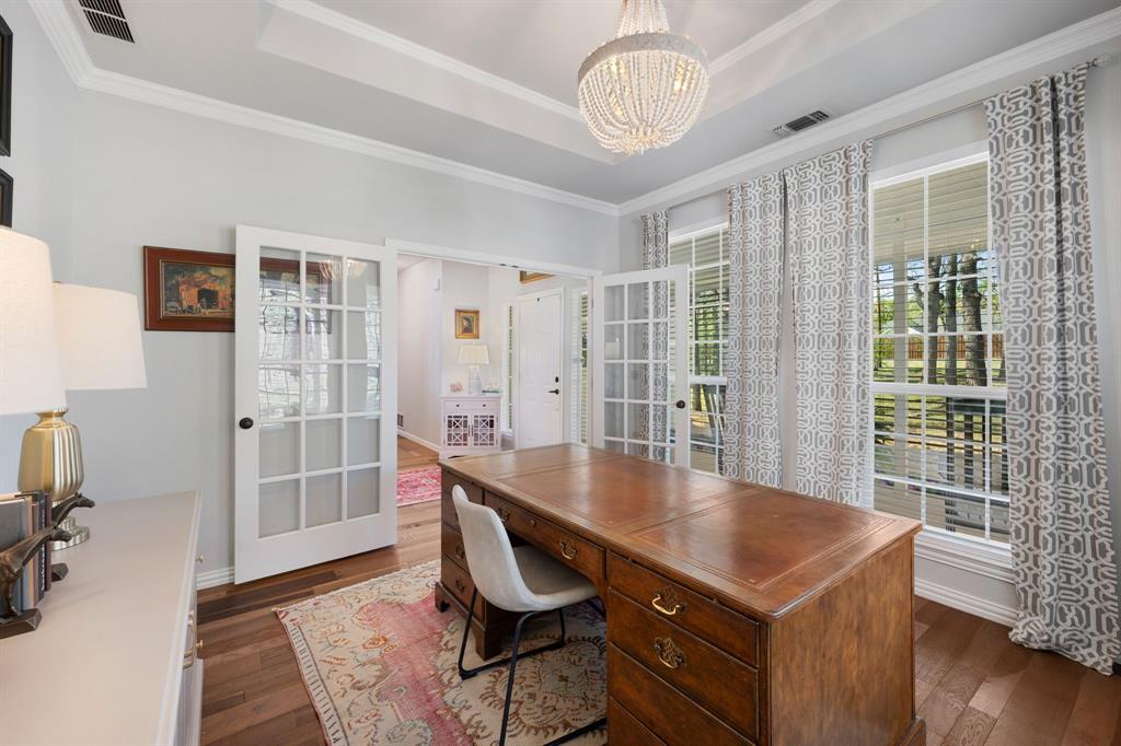 965 Stonecrest Road Argyle, TX 76226 - Photo 8 of 29 Office space featuring dark hardwood finished floors, a chandelier, crown molding, French doors, and expansive windows.