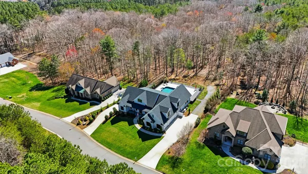an aerial view of a house with a garden