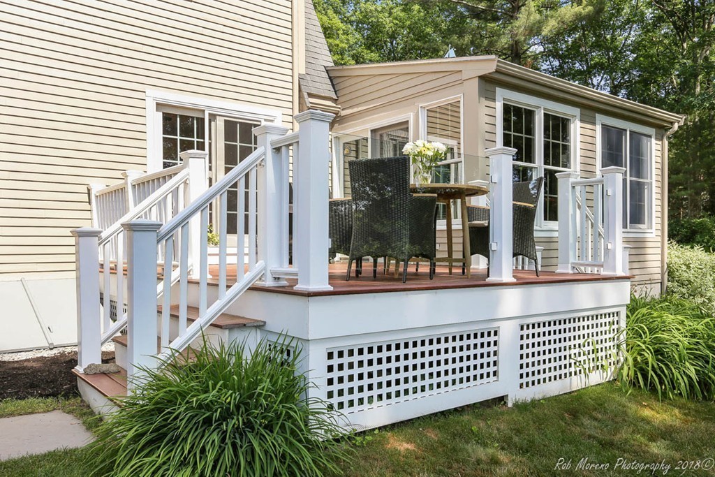 20 Wilmor Road Topsfield, MA 01983 - Photo 21 of 30 a front view of a house with a garden