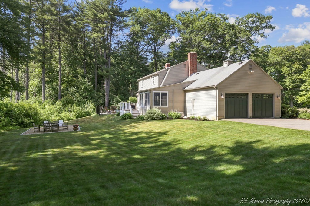 20 Wilmor Road Topsfield, MA 01983 - Photo 23 of 30 a front view of a house with a garden