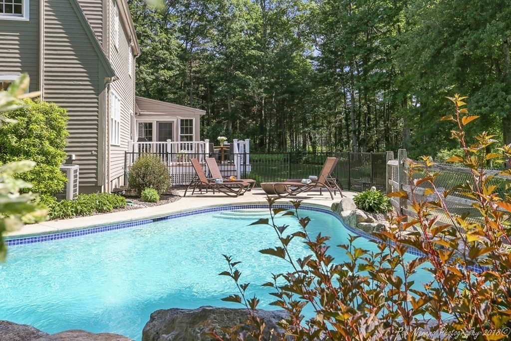 20 Wilmor Road Topsfield, MA 01983 - Photo 25 of 30 a view of a house with backyard sitting area and garden