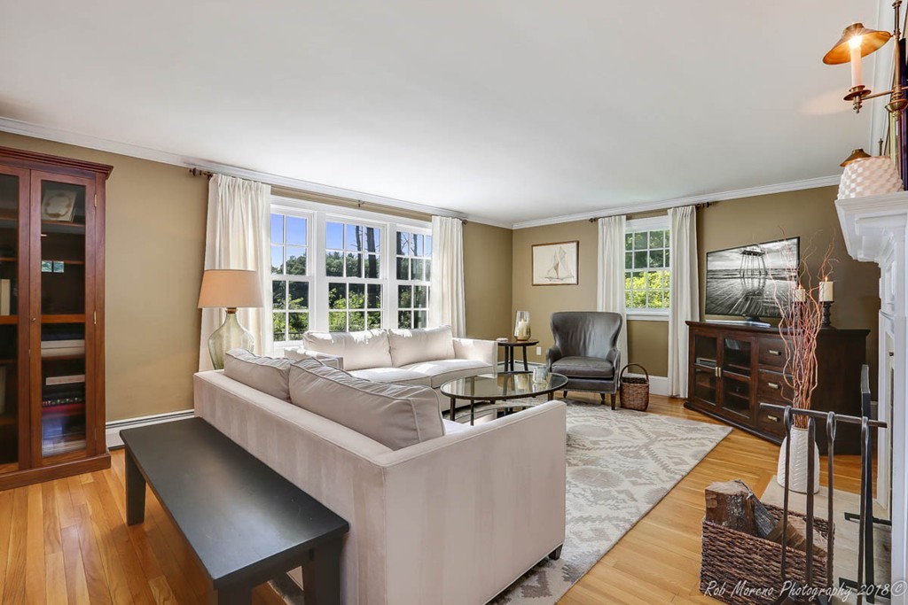 20 Wilmor Road Topsfield, MA 01983 - Photo 8 of 30 a living room with furniture and a flat screen tv