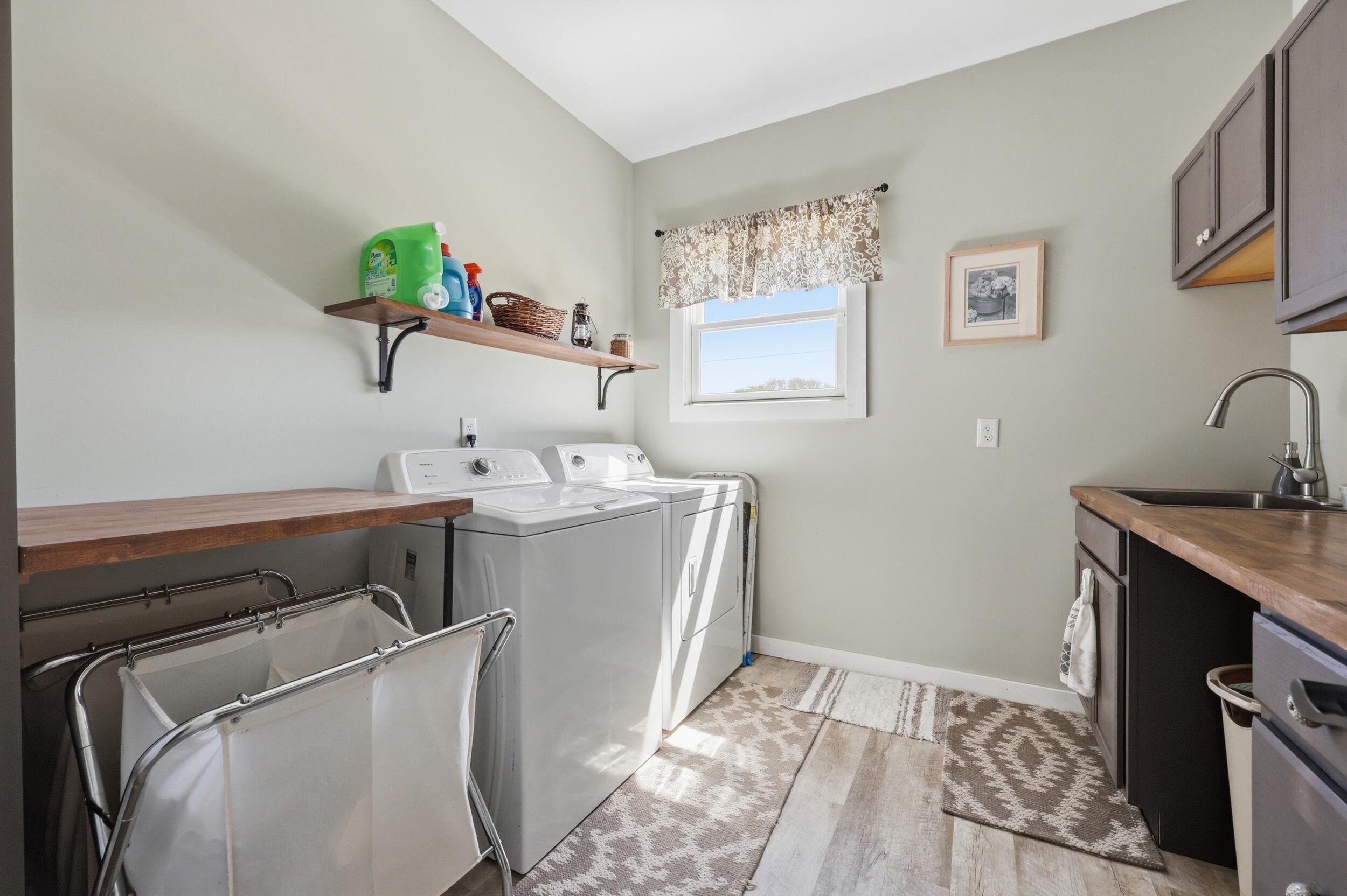 100 Collins Risk Road Georgetown, KY 40324 - Photo 37 of 84 You will enjoy doing laundry in this room! Spacious laundry area with large sink, cabinetry and folding area!