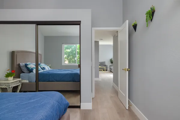 a en suite bathroom with a sink and mirror