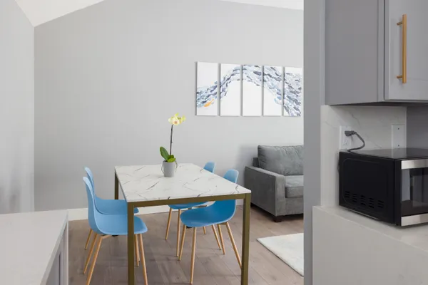 a view of a dining room with furniture