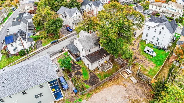 an aerial view of residential house with outdoor space