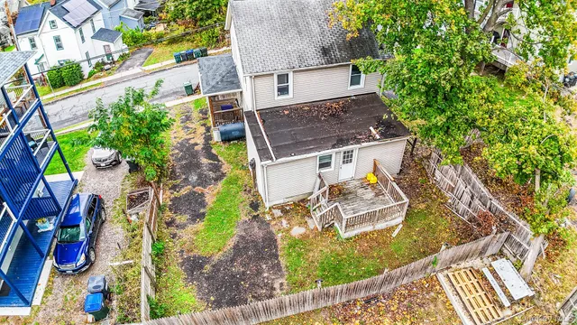 view of a house with a yard