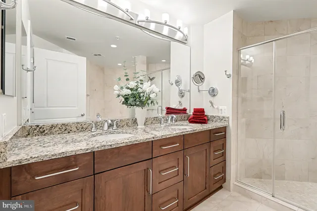 a bathroom with a shower and a toilet