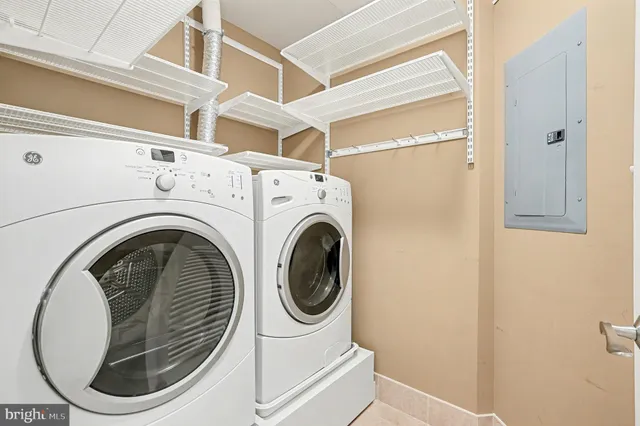 a dining room with furniture window and wooden floor