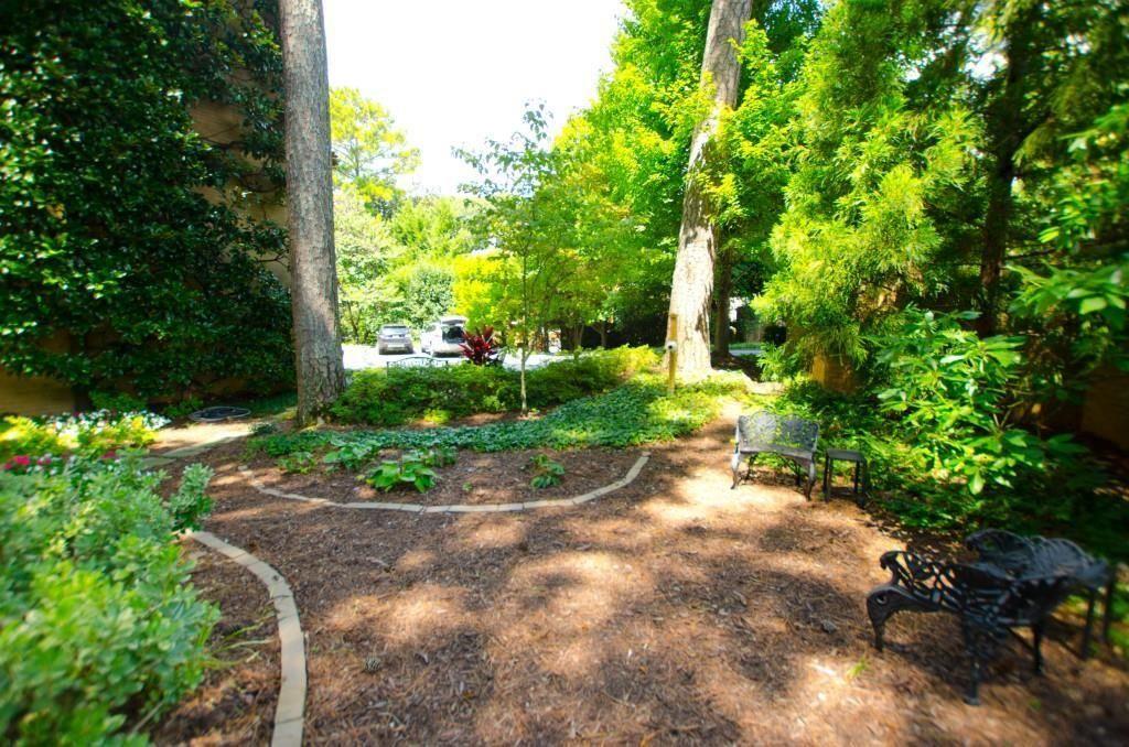 2734 Peachtree Road Northwest, Unit C101 Atlanta, GA 30305 - Photo 20 of 23 a view of a pathway with a yard