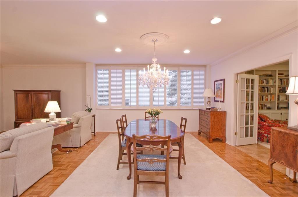 2734 Peachtree Road Northwest, Unit C101 Atlanta, GA 30305 - Photo 3 of 23 a view of a a dining room with furniture window and outside view