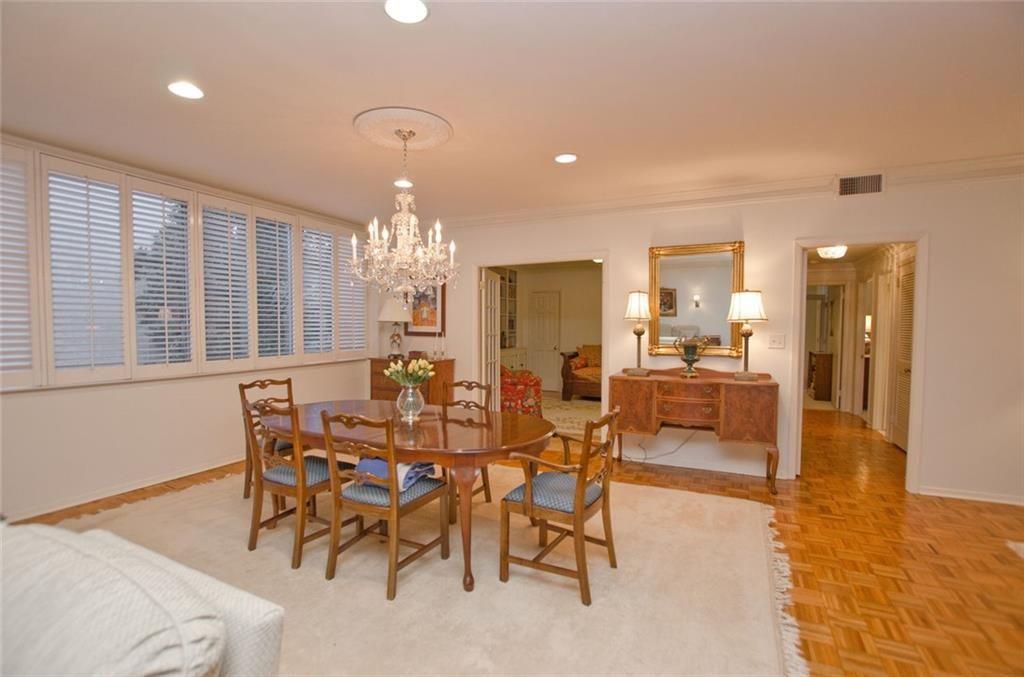 2734 Peachtree Road Northwest, Unit C101 Atlanta, GA 30305 - Photo 4 of 23 a view of a dining room with furniture