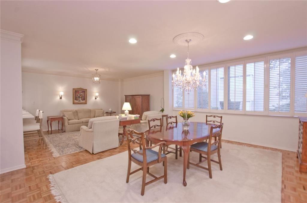 2734 Peachtree Road Northwest, Unit C101 Atlanta, GA 30305 - Photo 10 of 23 a view of a dining room with furniture
