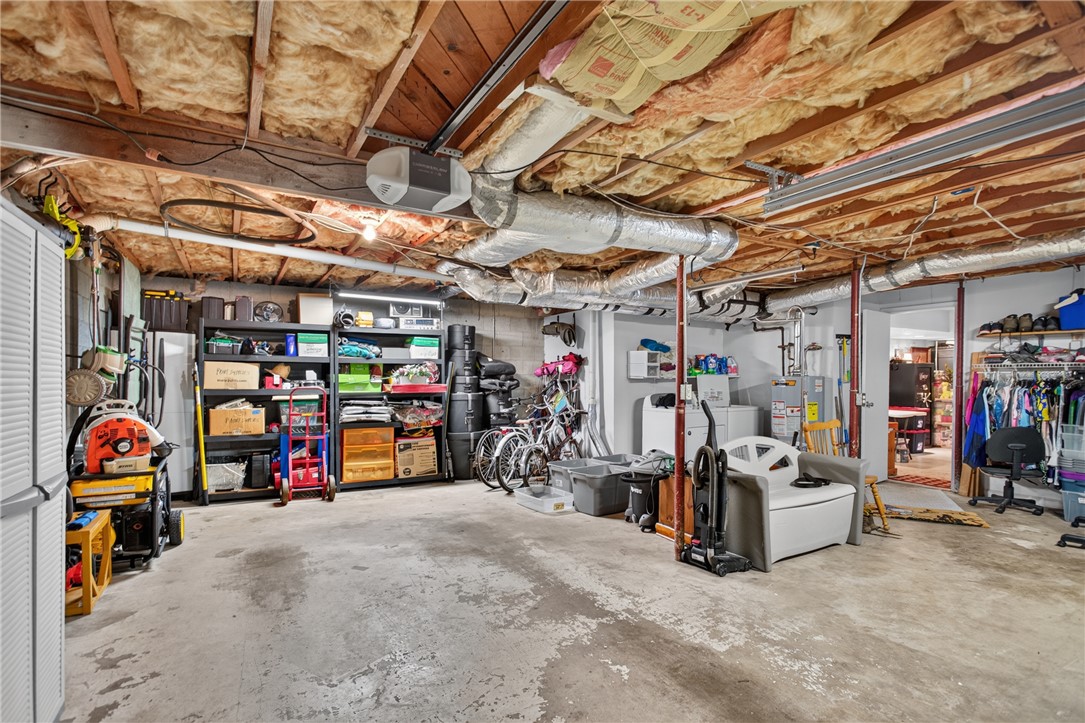 104 Laurel Lane Seneca, SC 29678 - Photo 28 of 36 A spacious, unfinished basement provides ample storage and utility space.
