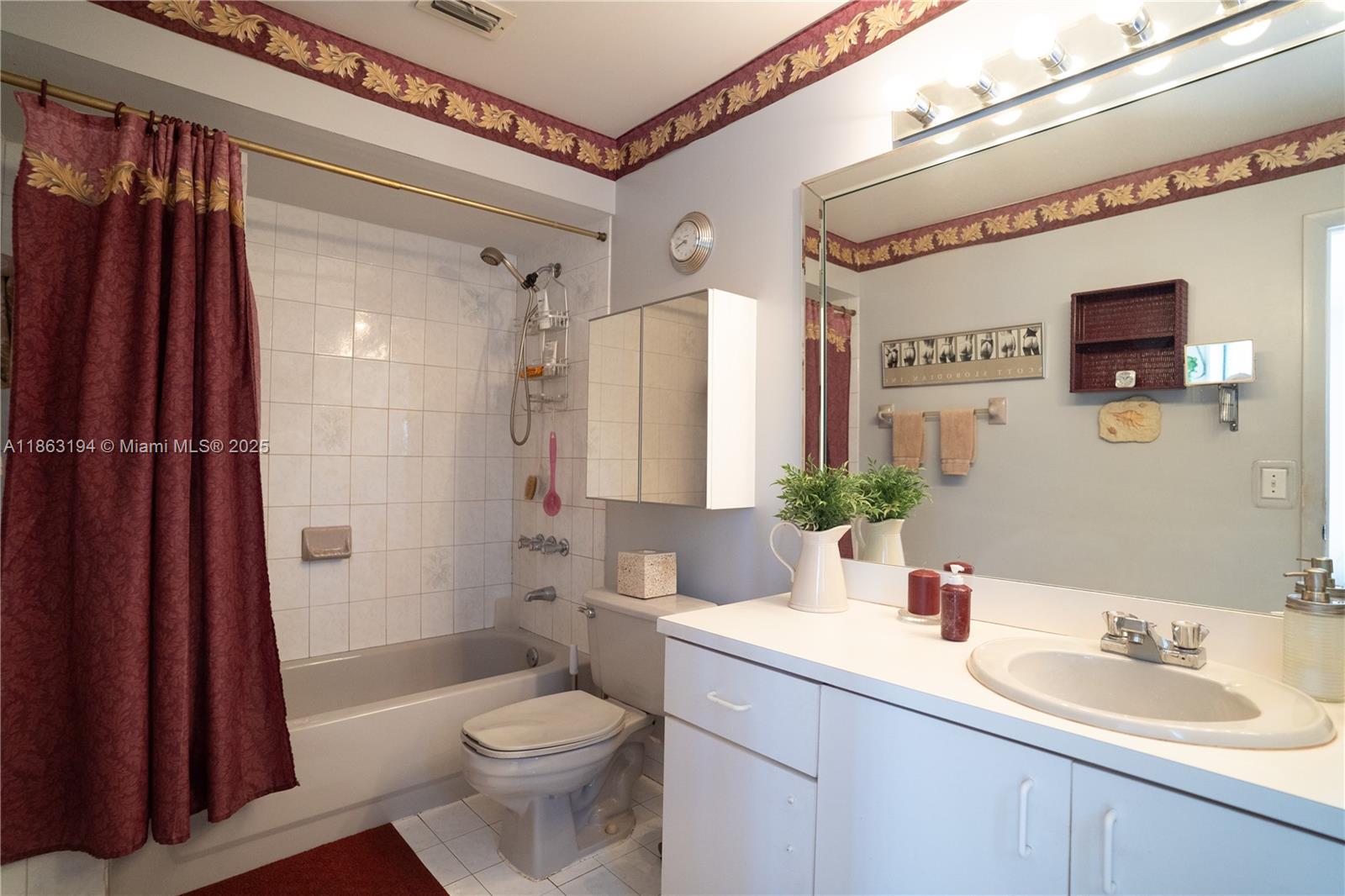 11680 Southwest 92nd Street Miami, FL 33176 - Photo 18 of 44 a bathroom with a sink a toilet and shower