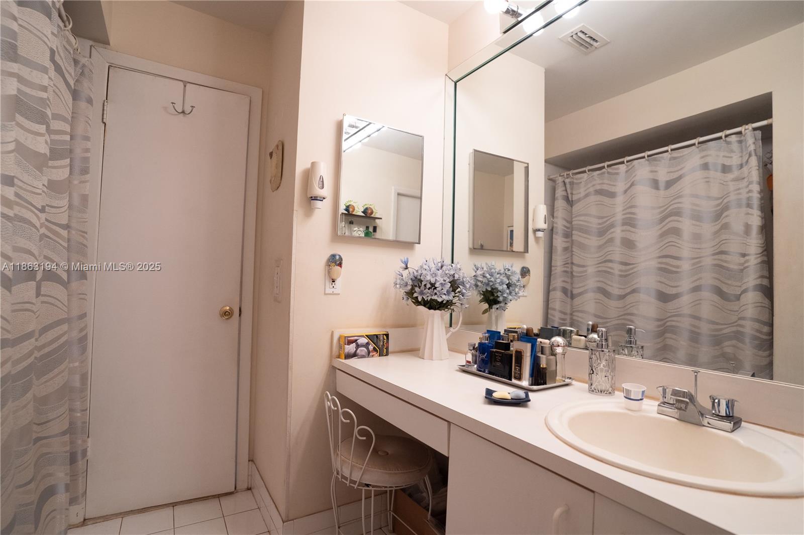 11680 Southwest 92nd Street Miami, FL 33176 - Photo 20 of 44 a bathroom with a sink and a mirror