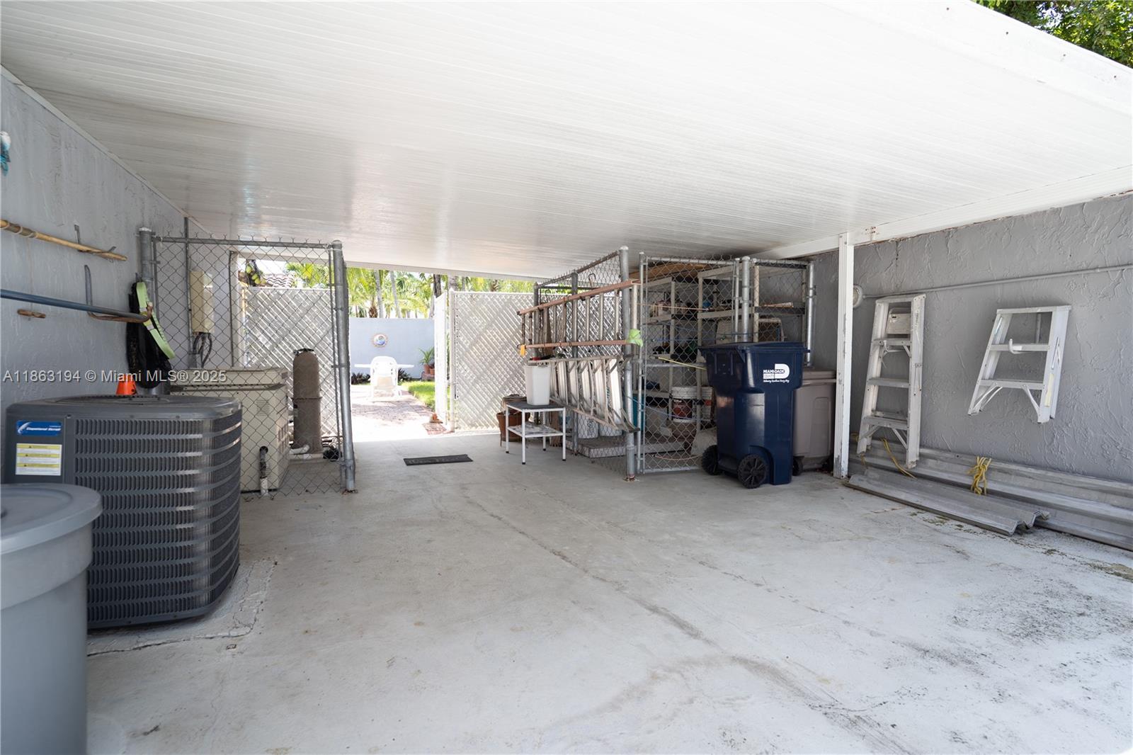 11680 Southwest 92nd Street Miami, FL 33176 - Photo 25 of 44 a view of a livingroom with walk in closet