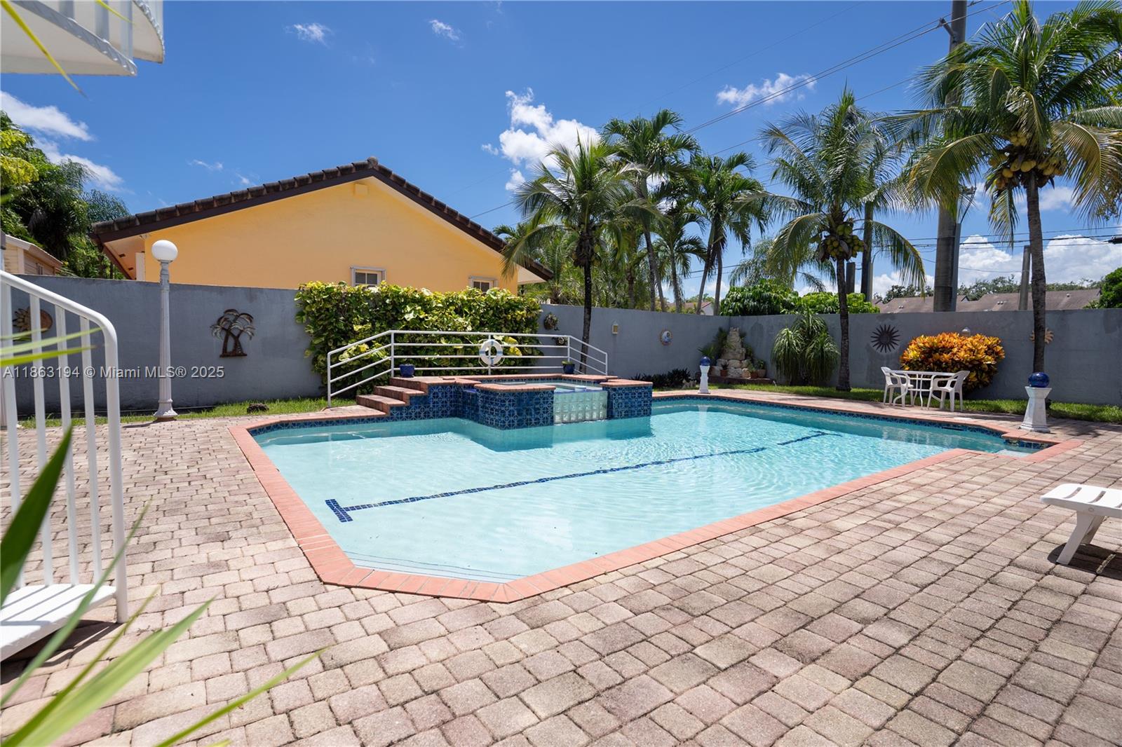 11680 Southwest 92nd Street Miami, FL 33176 - Photo 28 of 44 a view of a house with backyard and trees