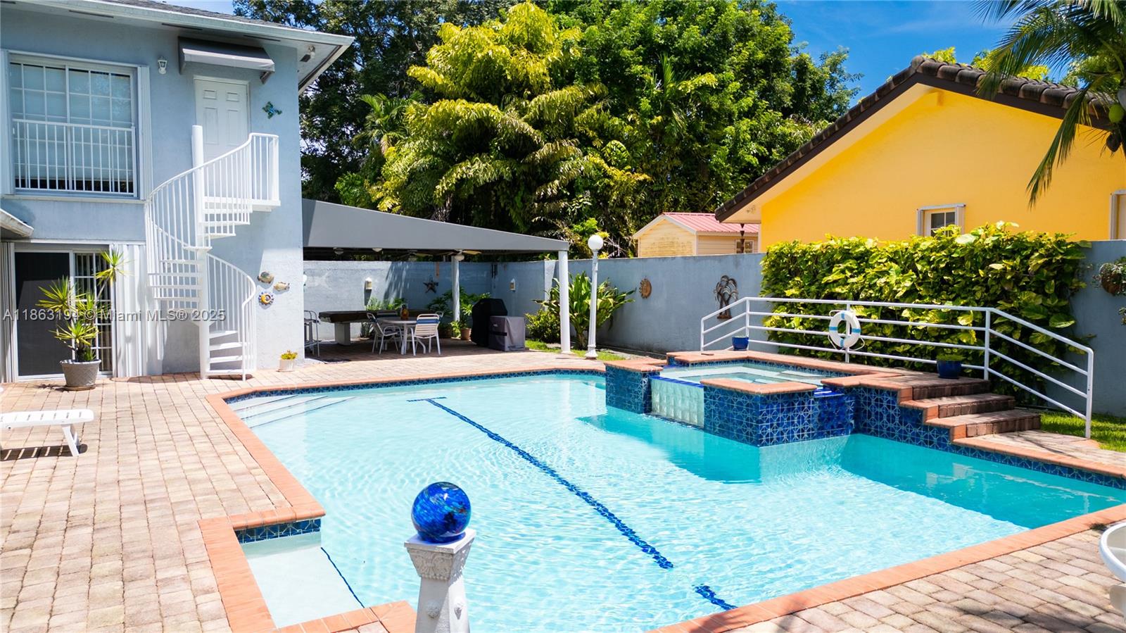 11680 Southwest 92nd Street Miami, FL 33176 - Photo 41 of 44 a view of swimming pool with seating area