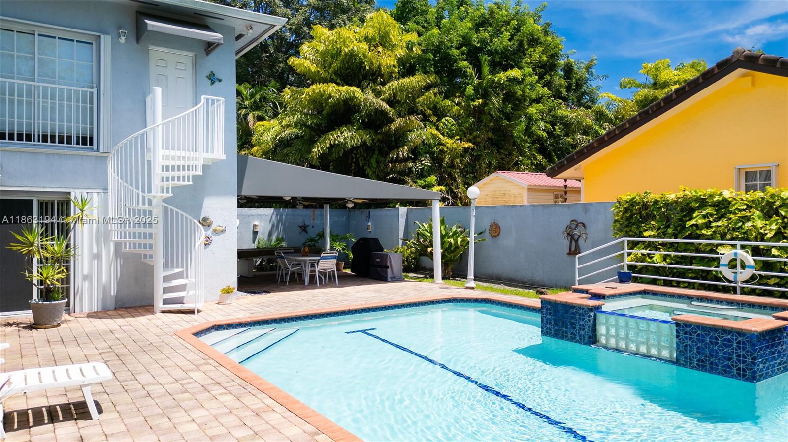 11680 Southwest 92nd Street Miami, FL 33176 - Photo 42 of 44 a view of a house with a backyard