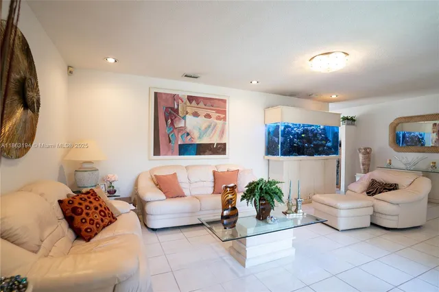 a living room with furniture and a couch