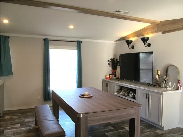 a kitchen with stainless steel appliances a stove and a refrigerator