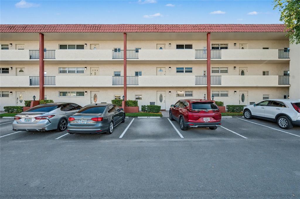 9520 South Hollybrook Lake Drive, Unit 103 Pembroke Pines, FL 33025 - Photo 19 of 55 a view of parking