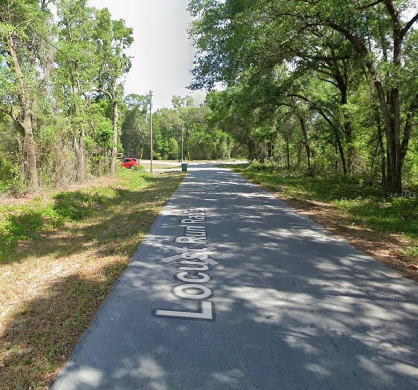 Locust Run Radiel Ocala, FL 34472 - Photo 4 of 6 a view of a street