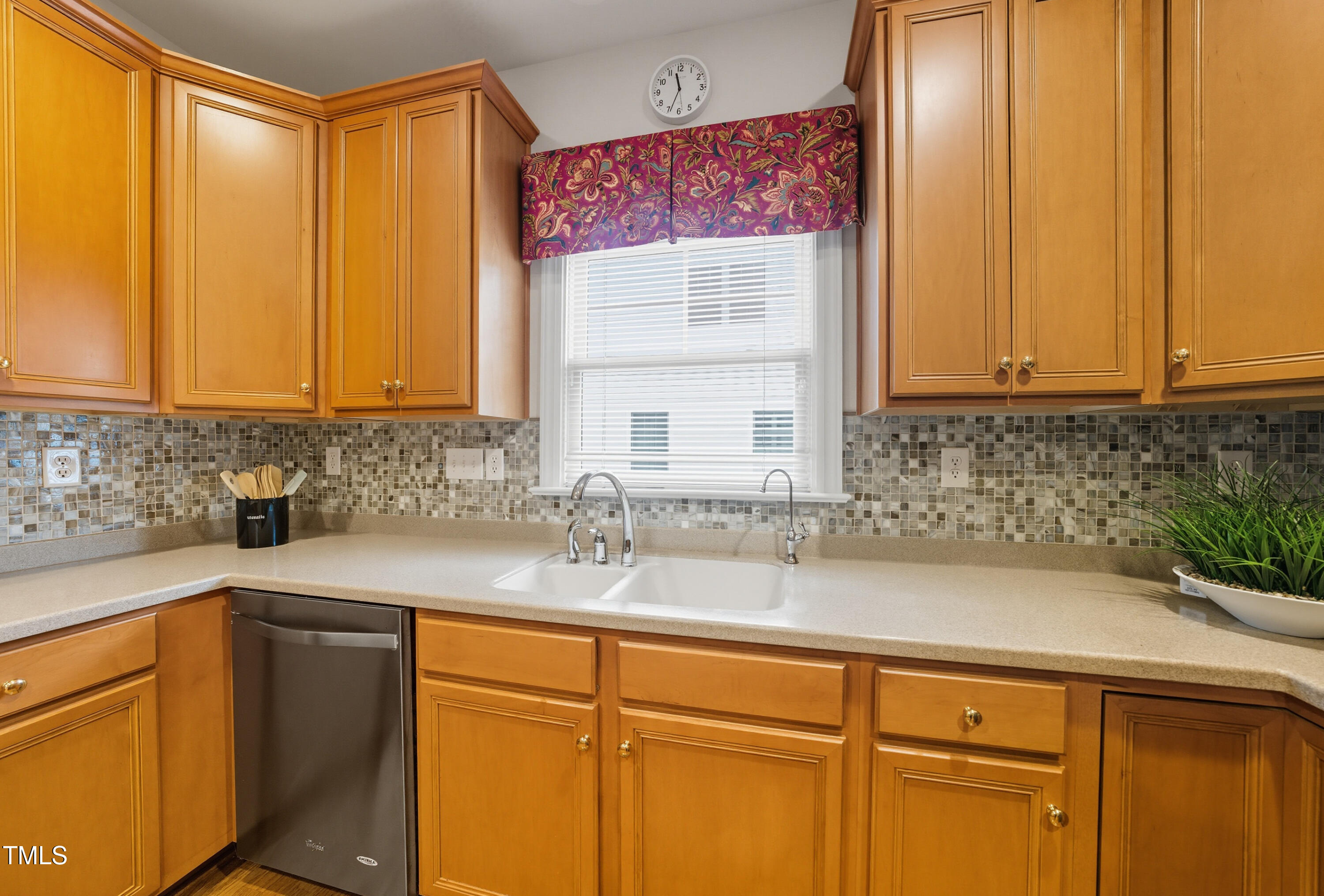 5210 Rio Grande Drive Raleigh, NC 27616 - Photo 13 of 45 a kitchen with a sink and cabinets